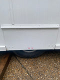 Single axle wheel box flap